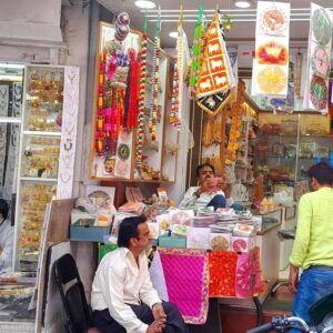 Tourists shopping at Anjuna flea market in Goa