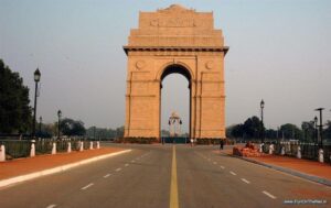 India Gate war memorial illuminated at night in New Delhi, India